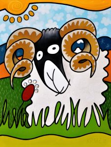 Der Widder und die Blume im Gras
